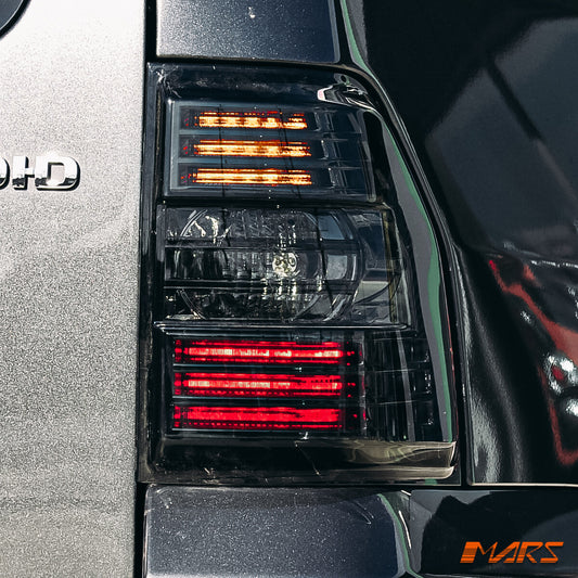 Smoked Tail Lights with LED Indicators for Mitsubishi Pajero NS NT NW 2007-2021