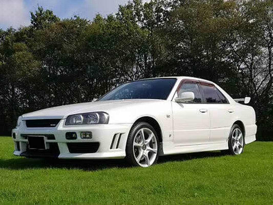 For Nissan Skyline R34 GTT NI Style R-Tune FRP Front Bumper - OEM Fit 1998-2002