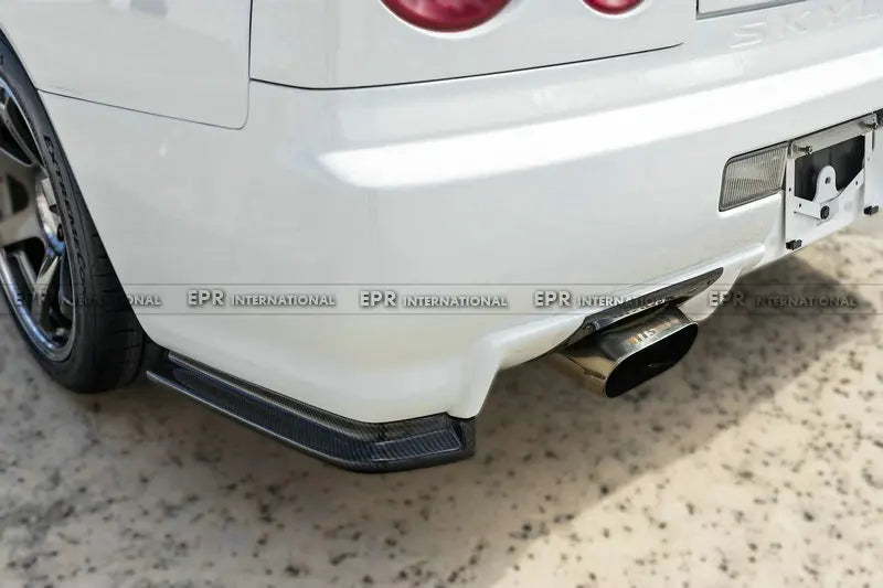 For Nissan Skyline R34 GTR NIS Style Carbon Fiber Rear Spat Extensions - OEM Fit JDM