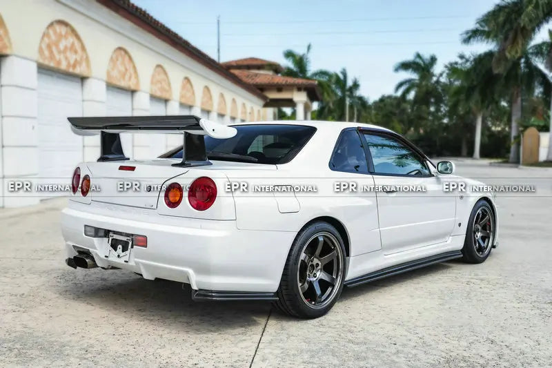 For Nissan Skyline R34 GTR NIS Style Carbon Fiber Rear Spat Extensions - OEM Fit JDM